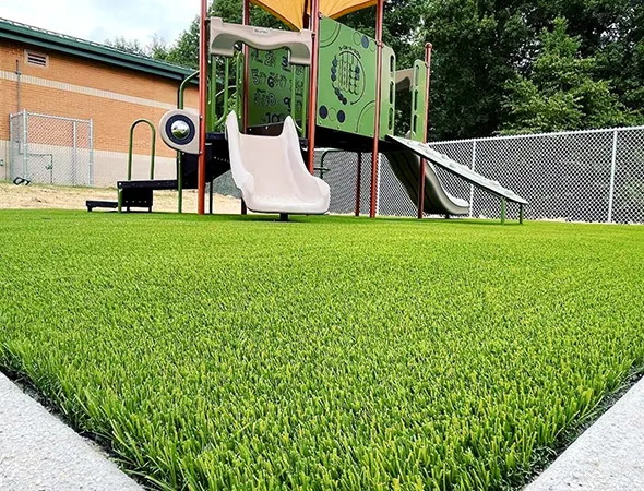 Professional playground turf installation for a childcare center in Suwanee, GA