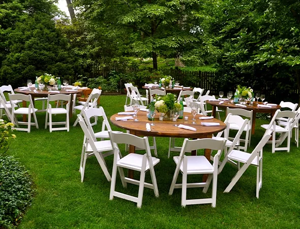 Guests gathered on durable synthetic turf during an outdoor wedding reception