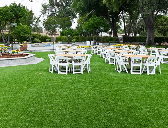 Close-up of dense artificial turf built for high-traffic entertainment venues