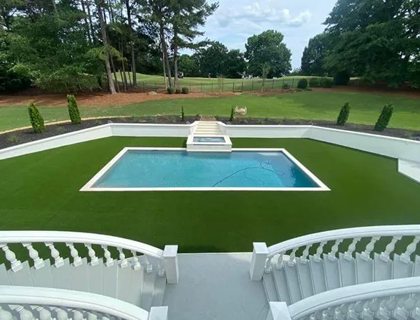 Artificial turf installed around a residential pool in Gainesville, GA