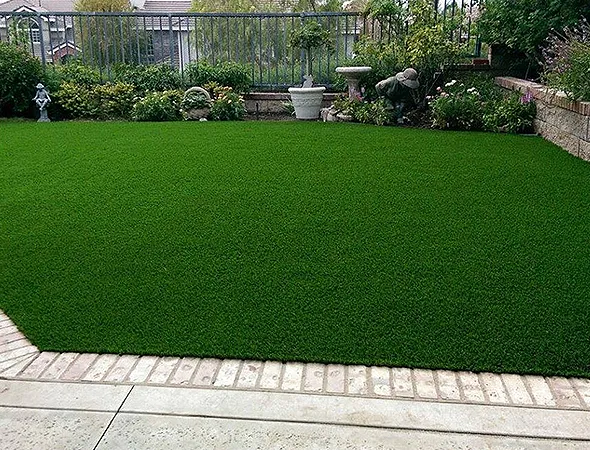 Artificial grass lawn beside a residential pool in Roswell, Georgia