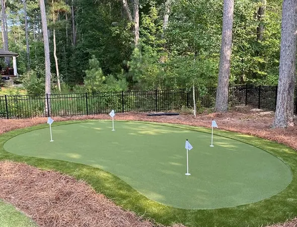 Synthetic athletic field turf installation for consistent outdoor play