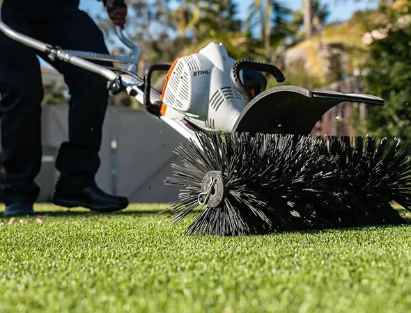 Turf grooming service to refresh and improve artificial grass